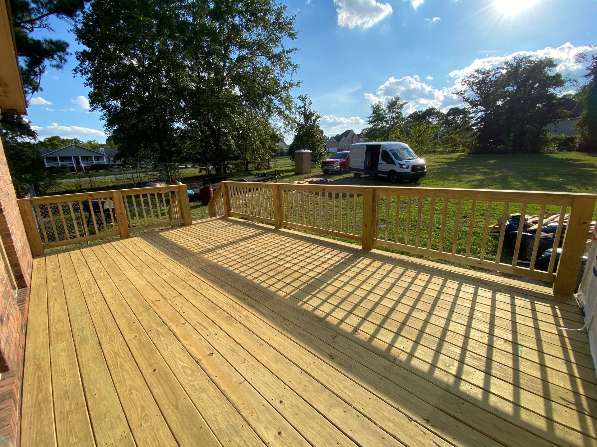 Home addition deck after stained — Marietta, GA, Estate Solutions