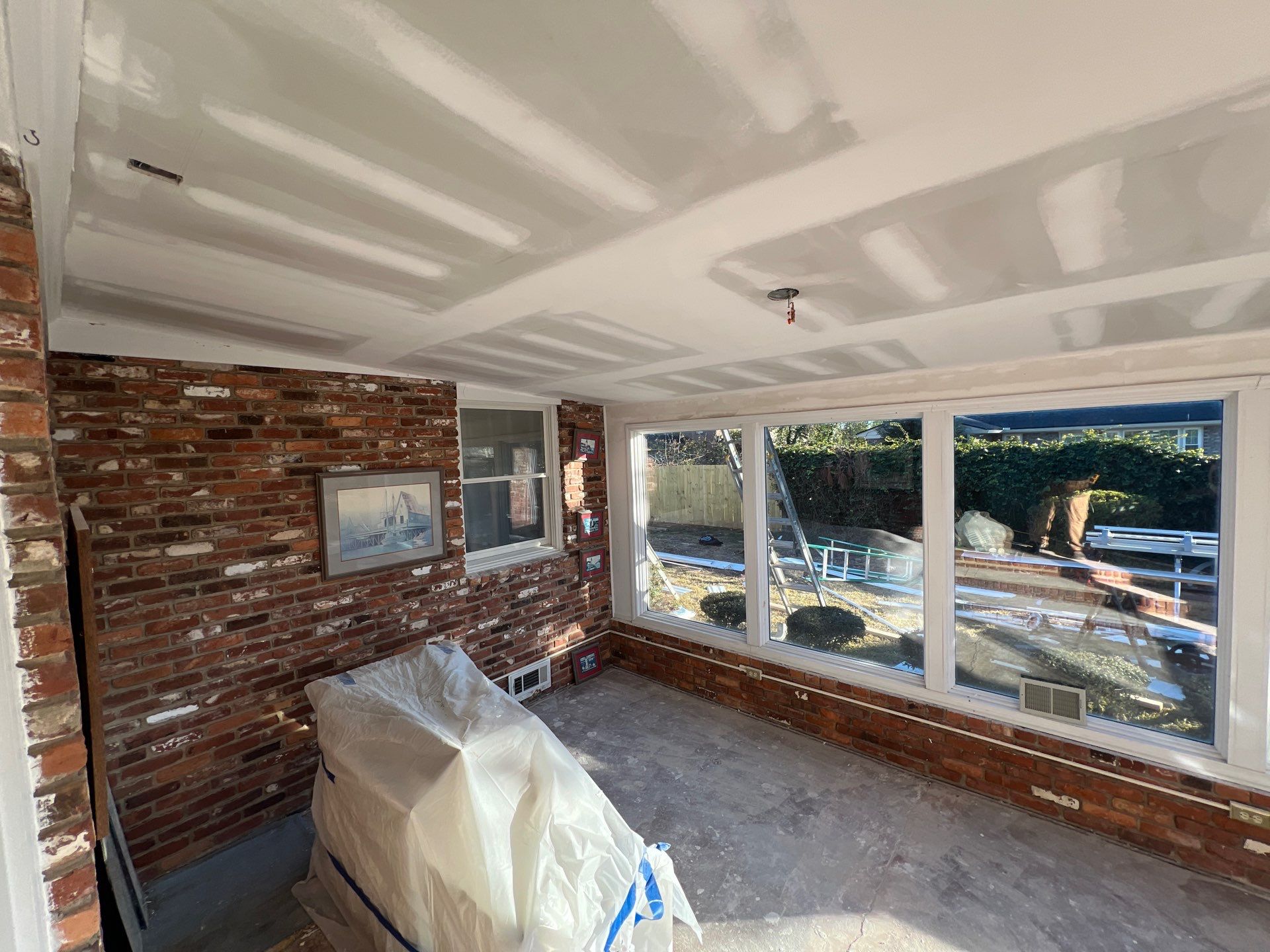 Interior storm water damage subfloor exposed — Marietta, GA, Estate Solutions